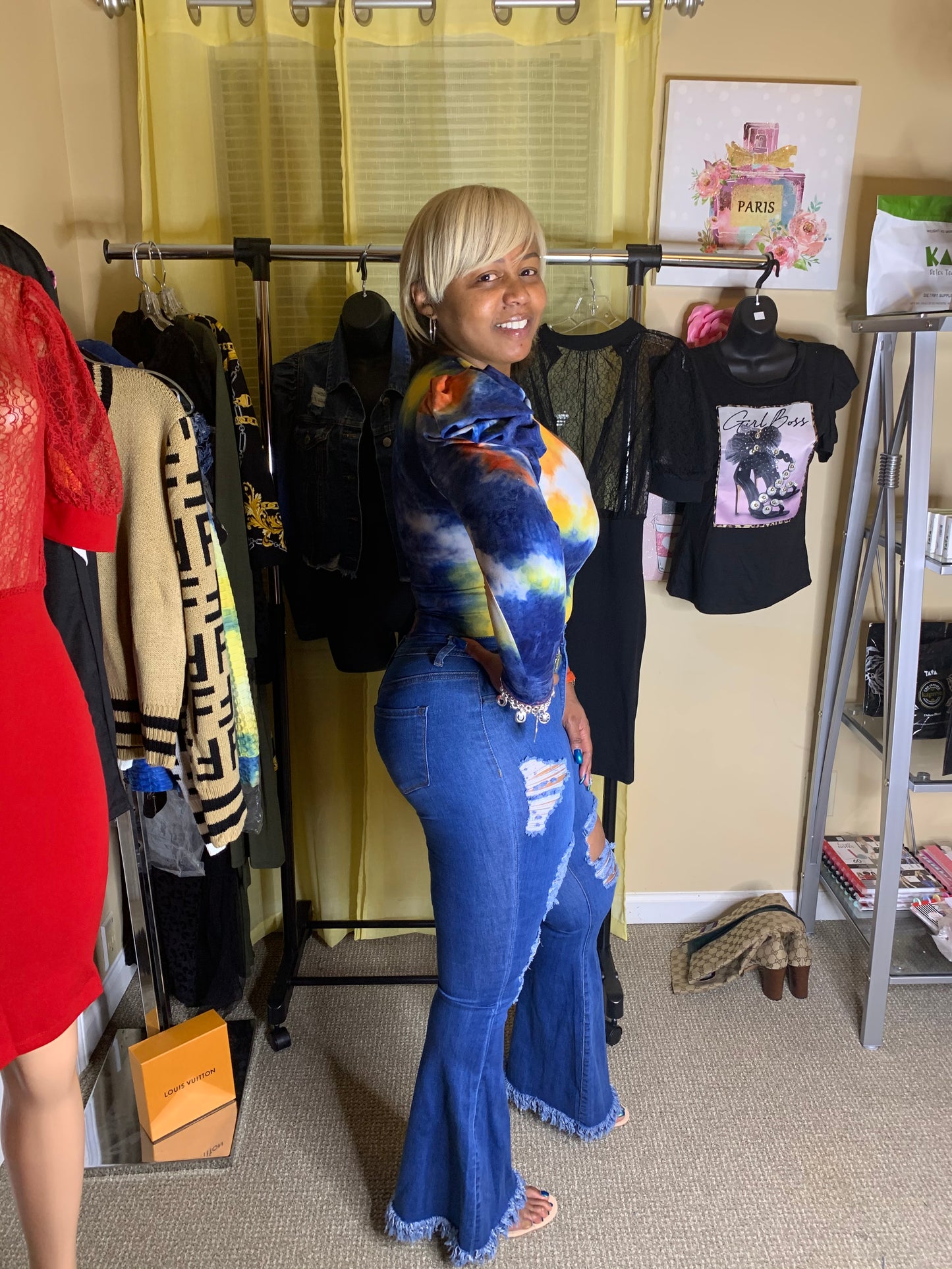 HIGH WAISTED RIPPED BELL BOTTOM JEANS